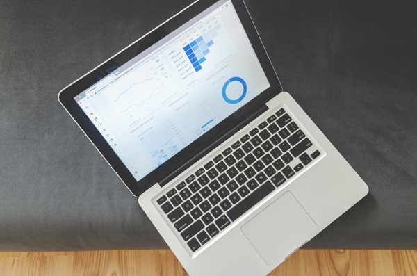Laptop displaying a website analytics dashboard